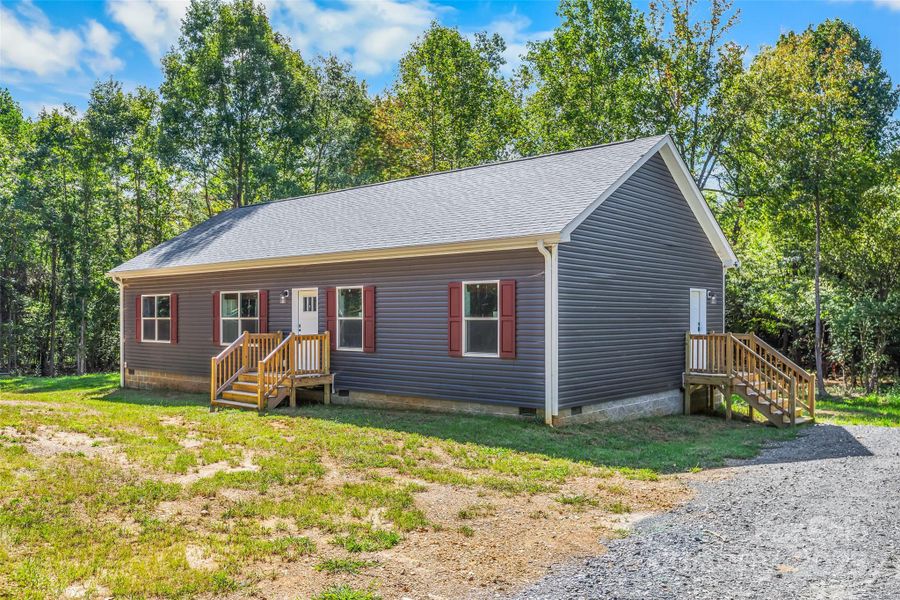 Front exterior of a new home in , New London, NC, highlighting curb appeal (Image 23).