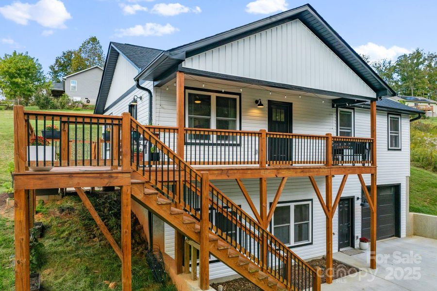 Step up on the the covered porch and open deck (plus the patio beyond) for nice outdoor living! Step up on the the covered porch and open deck (plus the patio beyond) for nice outdoor living!