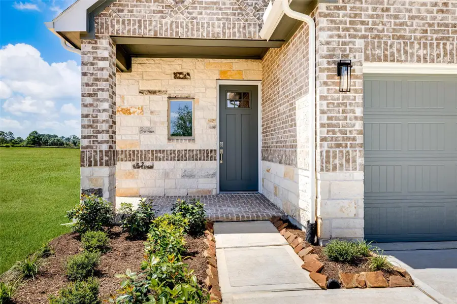 Exterior details and patio area of a home in , Waller (Image 3).