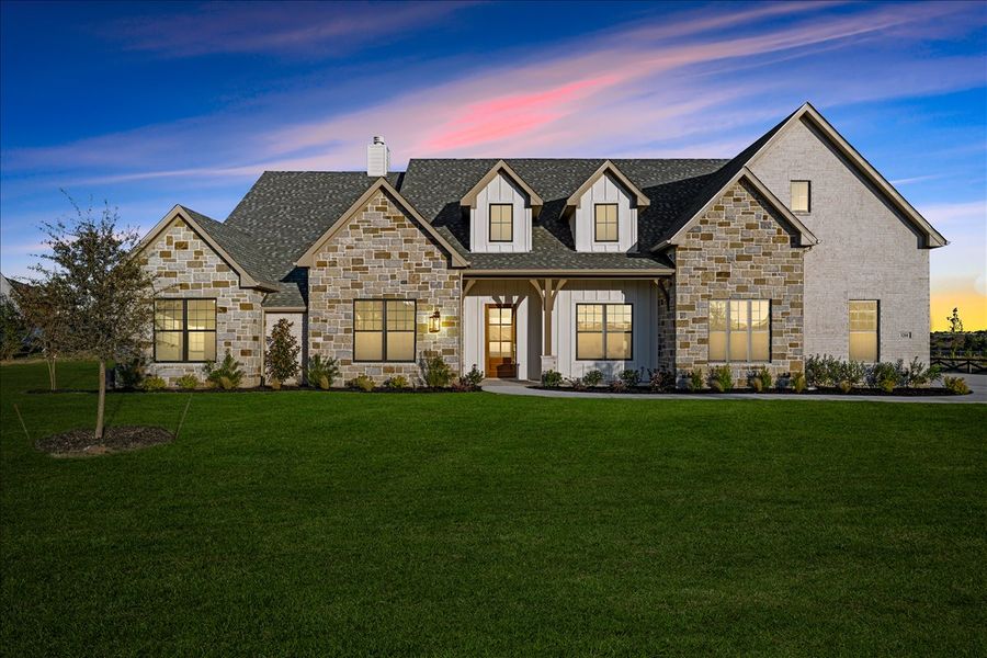 Front exterior of a new home in Stardust Ranch, Northlake, TX, highlighting curb appeal (Image 30). Front exterior of a new home in Stardust Ranch, Northlake, TX, highlighting curb appeal (Image 30).