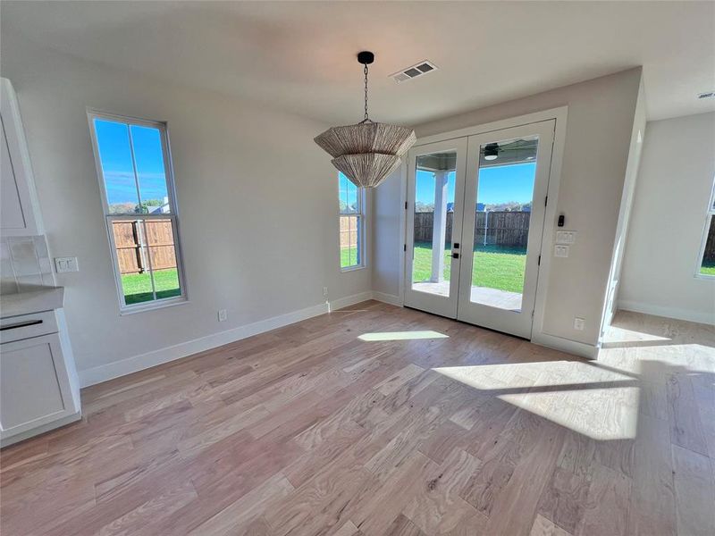 Dining Room with Natural Light and hardwood floors