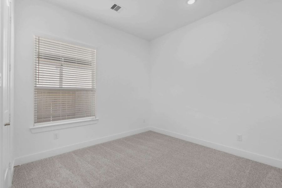Representative unfurnished interior of a home built from the Lakeway by Chesmar Homes in Meridiana 50's, Manvel (Image 46).