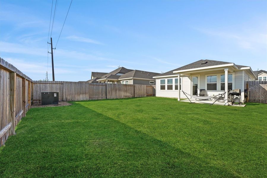 Exterior details and patio area of a home in Mason Woods 40s, Cypress (Image 21). Exterior details and patio area of a home in Mason Woods 40s, Cypress (Image 21).