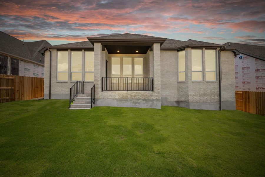 Front exterior of a new home in Palmera Ridge: 60ft. lots, Leander, TX, highlighting curb appeal (Image 1). Front exterior of a new home in Palmera Ridge: 60ft. lots, Leander, TX, highlighting curb appeal (Image 1).