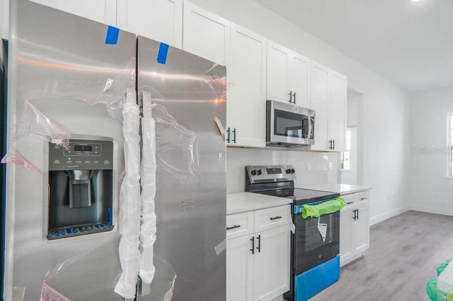 Furnished interior view inside a new home in , Ocala (Image 3).