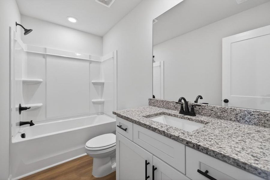 Furnished interior view inside a new home in , Commerce (Image 12).