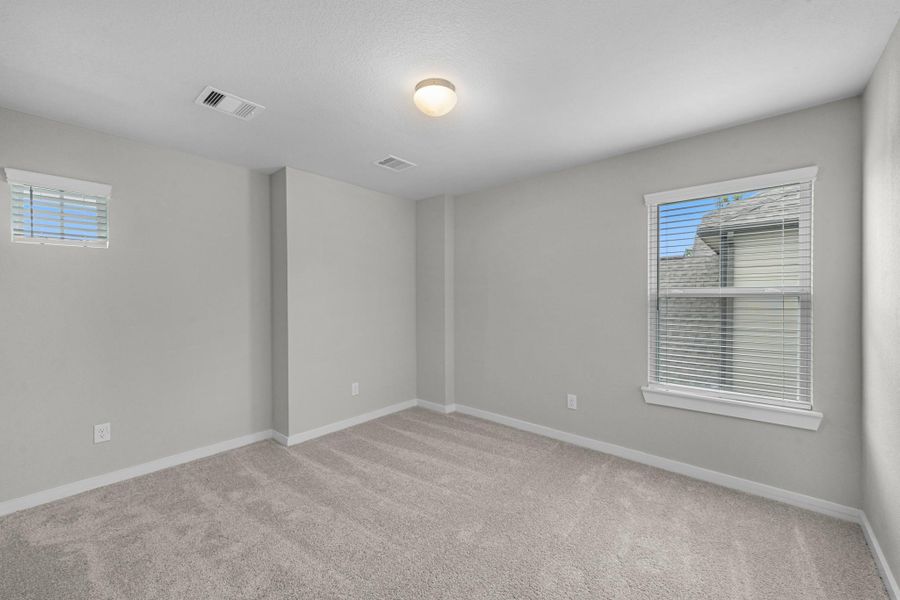 Spacious, unfurnished interior of a new home in Barton Creek Ranch, Conroe (Image 24). Spacious, unfurnished interior of a new home in Barton Creek Ranch, Conroe (Image 24).