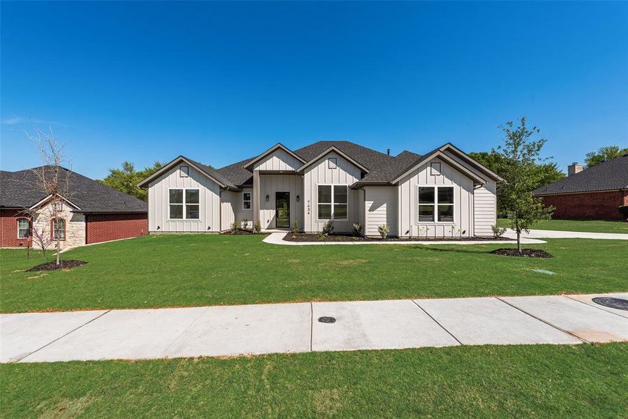 Front exterior of a new home in , Dallas, TX, highlighting curb appeal (Image 4).