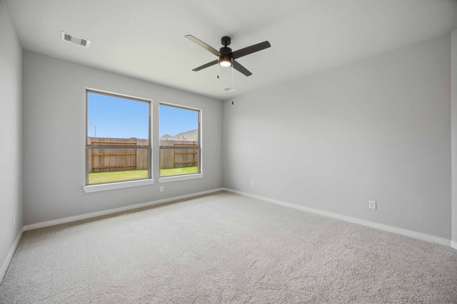 Spacious, unfurnished interior of a new home in Sunterra 40, Katy (Image 24).