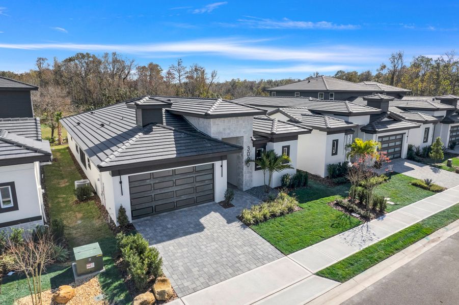 Representative exterior photo of a completed home built from the Courtyard 50 3BR by ABD Development in Hampton Green at Providence, Davenport, FL (Image 2).