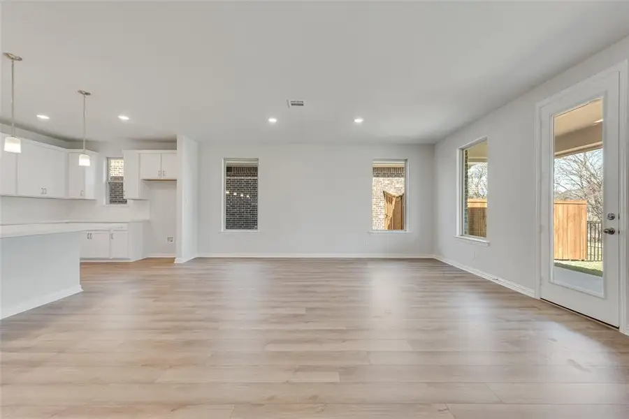 Spacious, unfurnished interior of a new home in Valencia On The Lake, Little Elm (Image 14).