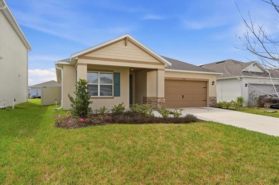 Front exterior of a new home in , Lakeland, FL, highlighting curb appeal (Image 22).