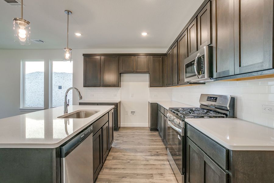 Representative furnished interior of a home built from the Palmer by Graham Hart Home Builder in Bear Ridge, Burleson (Image 8).