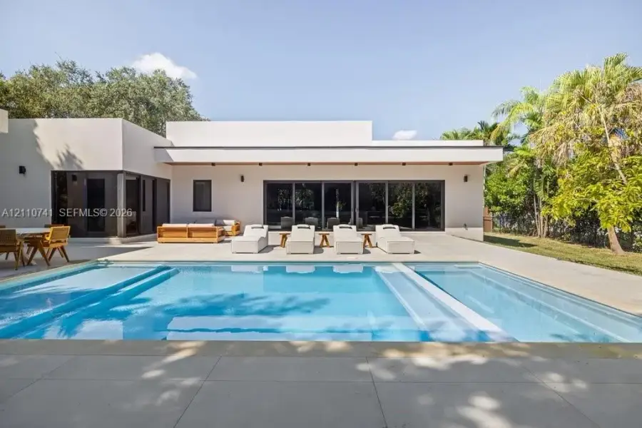 Exterior details and patio area of a home in , Pinecrest (Image 25). Exterior details and patio area of a home in , Pinecrest (Image 25).