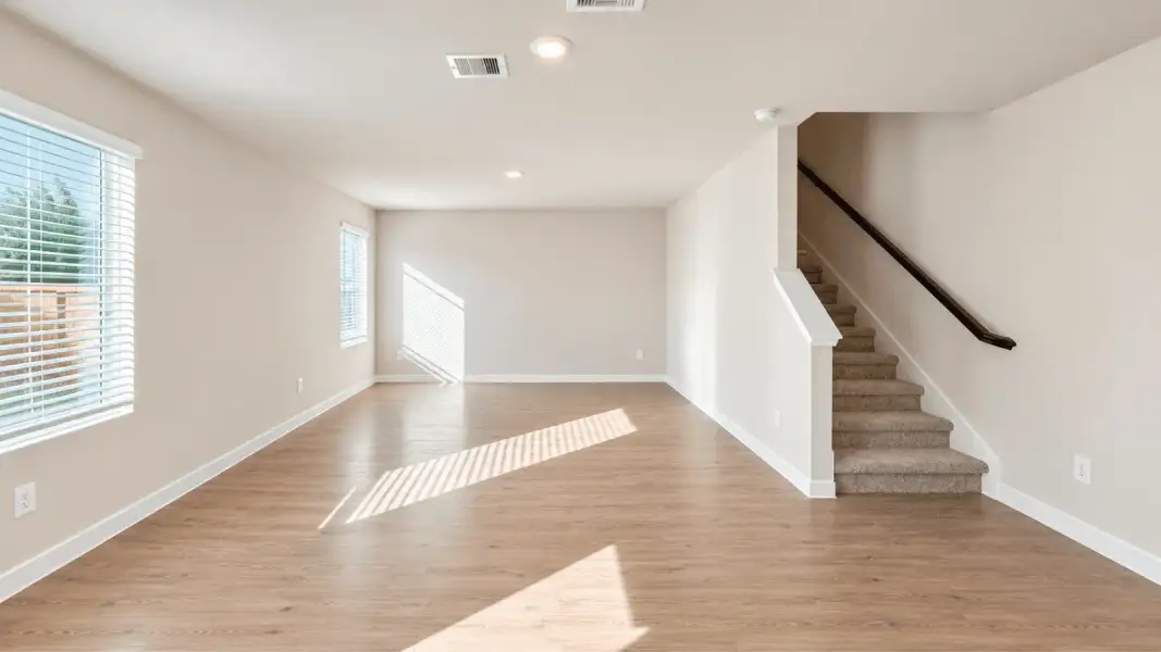 Representative unfurnished interior of a home built from the Davis by D.R. Horton in Flagstop Crossing, Odem (Image 12).