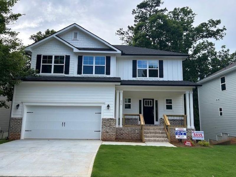Front exterior of a new home in Habersham Meadows, Demorest, GA, highlighting curb appeal (Image 1).