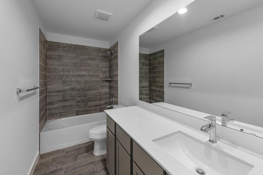 Furnished interior view inside a new home in Cypresswood Landing, Humble (Image 5).