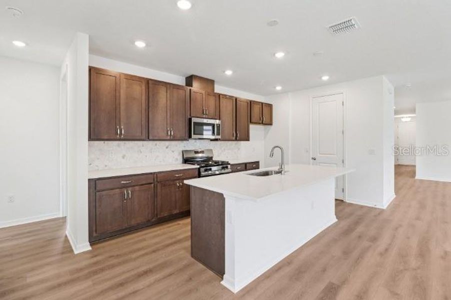 Furnished interior view inside a new home in Northlake at Ovation, Winter Garden (Image 4).
