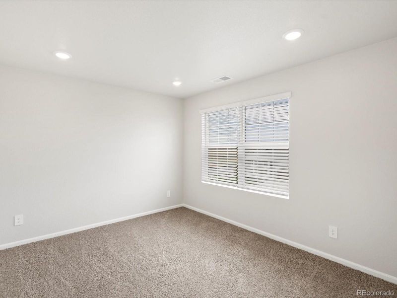 Spacious, unfurnished interior of a new home in Buffalo Highlands: The Flora Collection, Commerce City (Image 20).