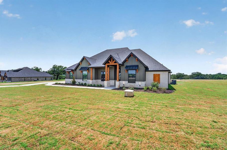 Front exterior of a new home in , Decatur, TX, highlighting curb appeal (Image 20).