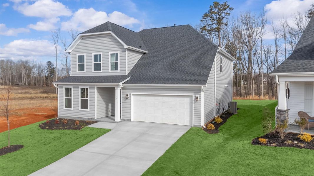 Front exterior of a new home in Fox Hollow, Spartanburg, SC, highlighting curb appeal (Image 21).