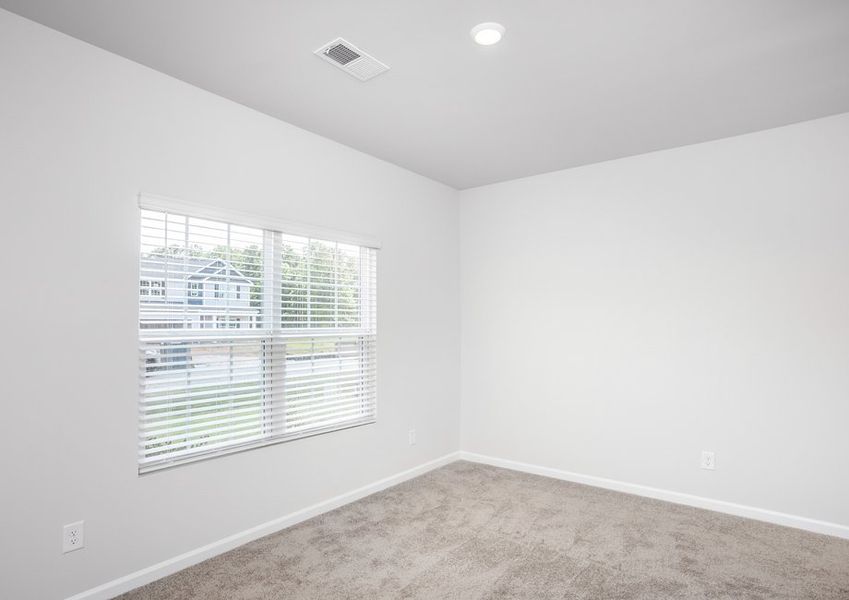 Spacious and open bedroom.