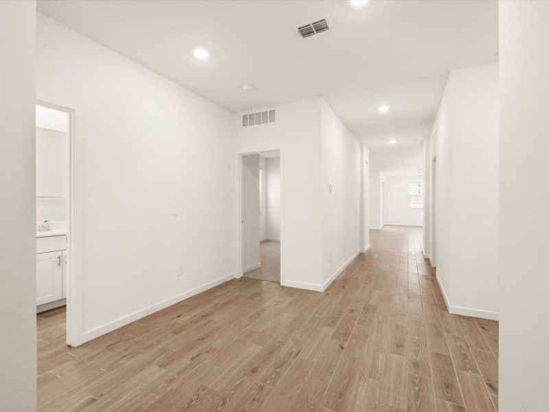 Spacious, unfurnished interior of a new home in Bella Vista Farms Estate Series, San Tan Valley (Image 13).