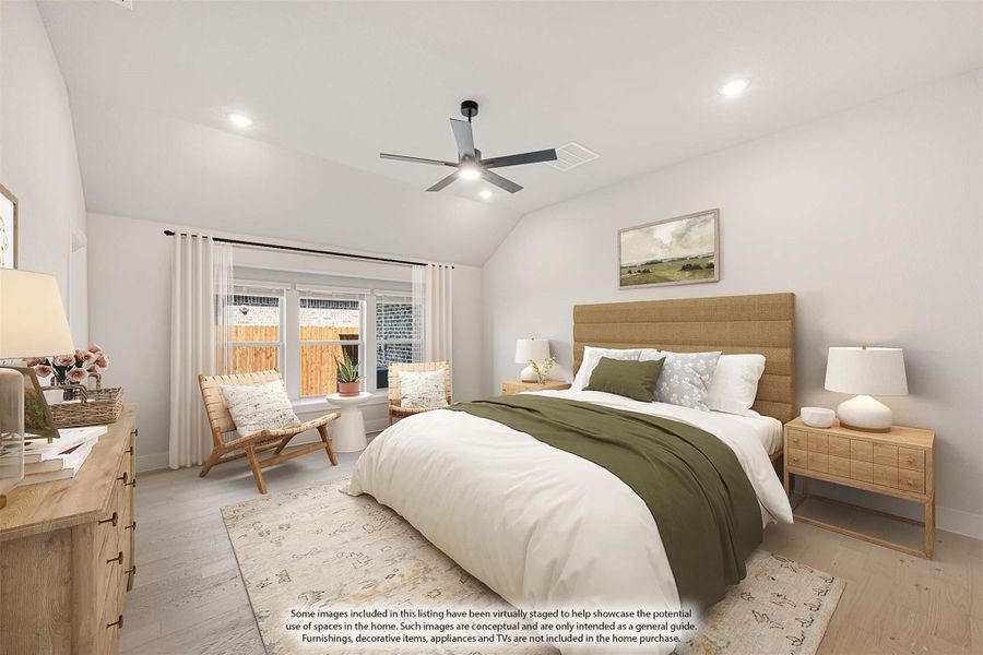 Bedroom with vaulted ceiling, ceiling fan, light wood floors, and large window with sitting area