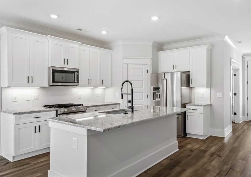 The kitchen includes an oversized island.