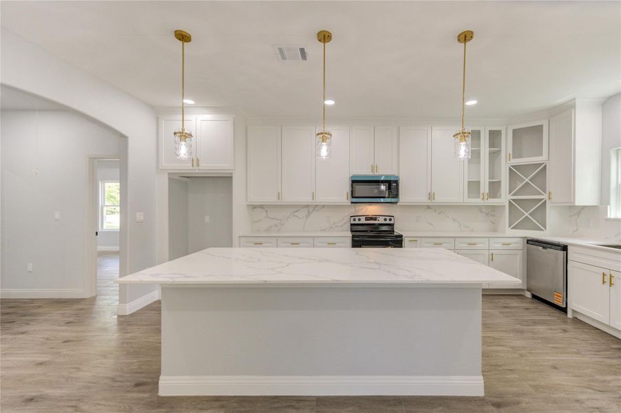 Furnished interior view inside a new home in , Woodbranch (Image 14).