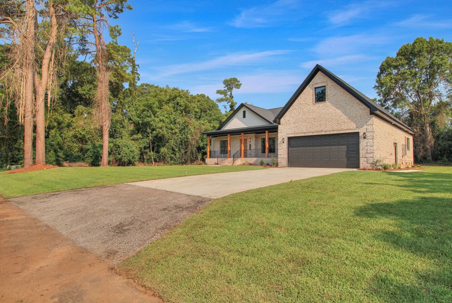 Front exterior of a new home in , Orangeburg, SC, highlighting curb appeal (Image 18).