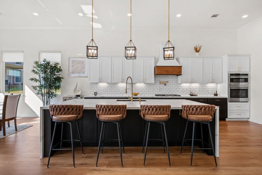 Kitchen island provides extra seating.