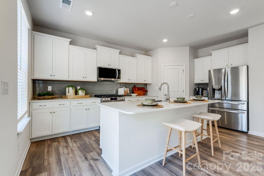 Furnished interior view inside a new home in Village of Waxhaw, Waxhaw (Image 5).
