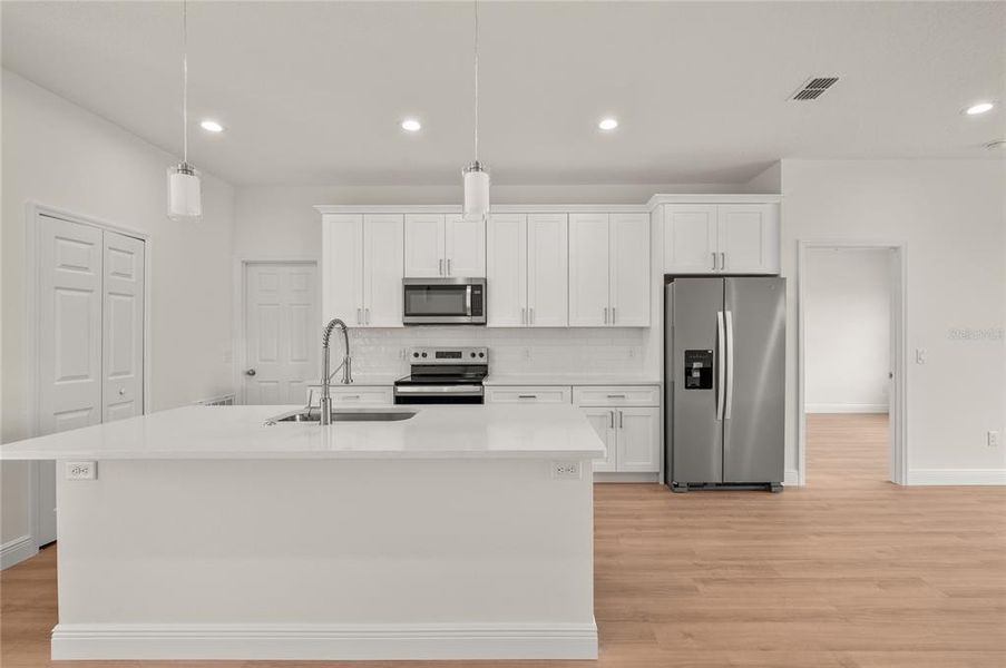 Furnished interior view inside a new home in , Osteen (Image 9).