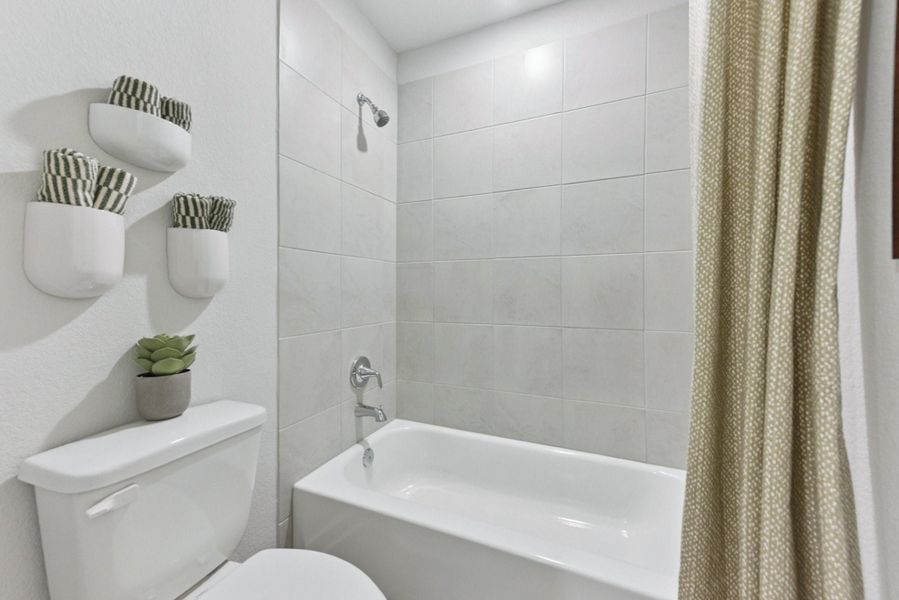 Furnished interior view inside a new home in The Overlook at Trinity Ranch, Elgin (Image 21). Furnished interior view inside a new home in The Overlook at Trinity Ranch, Elgin (Image 21).