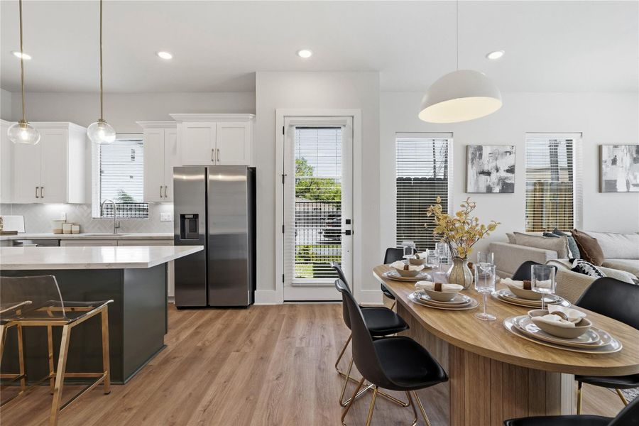 A sense of openness is immediately established upon entry, with 10-foot ceilings and a layout designed to promote natural flow throughout the main living level. A sense of openness is immediately established upon entry, with 10-foot ceilings and a layout designed to promote natural flow throughout the main living level.