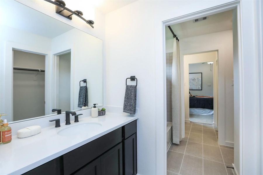 Furnished interior view inside a new home in Roman Forest, New Caney (Image 32).