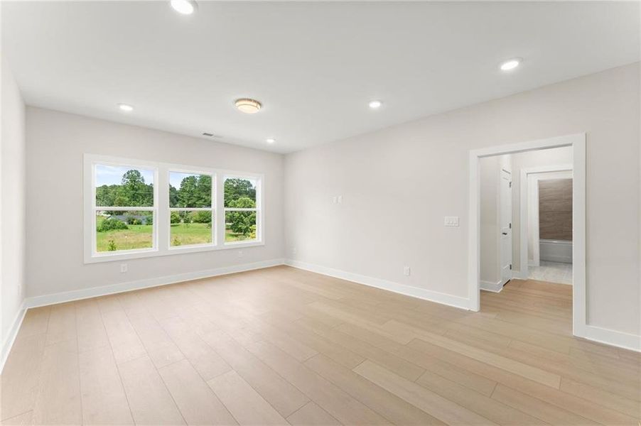 Spacious, unfurnished interior of a new home in Hillgrove Preserve, Powder Springs (Image 41).