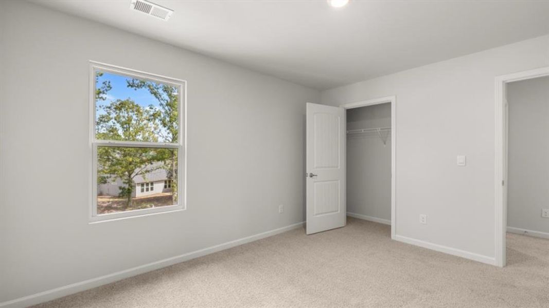 Spacious, unfurnished interior of a new home in Fairway 17 at Mirror Lake, Villa Rica (Image 34). Spacious, unfurnished interior of a new home in Fairway 17 at Mirror Lake, Villa Rica (Image 34).