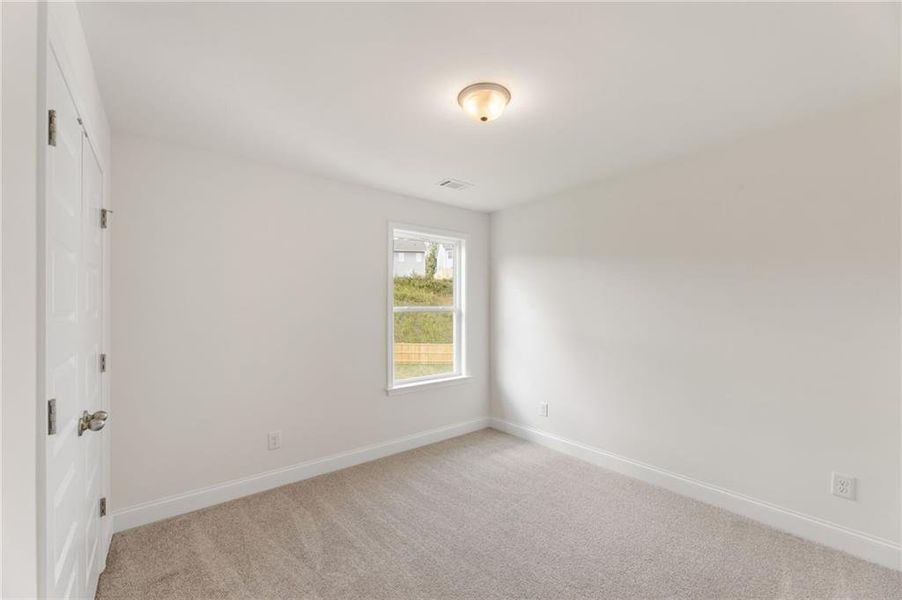 Spacious, unfurnished interior of a new home in Clark Farms, Flowery Branch (Image 29).