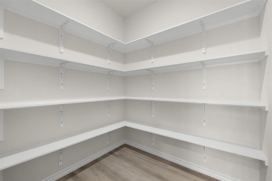 Ample shelving in this well-organized pantry offers generous storage. Ample shelving in this well-organized pantry offers generous storage.