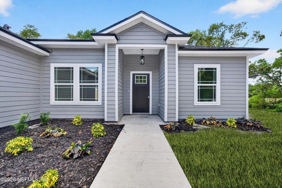 Front exterior of a new home in , Melrose, FL, highlighting curb appeal (Image 19). Front exterior of a new home in , Melrose, FL, highlighting curb appeal (Image 19).