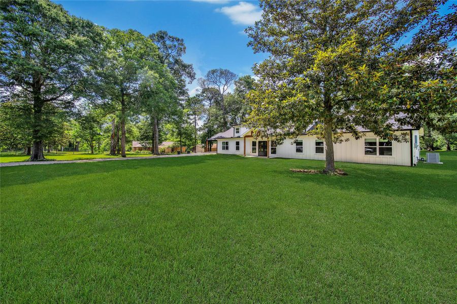 Exterior details and patio area of a home in , Splendora (Image 21).