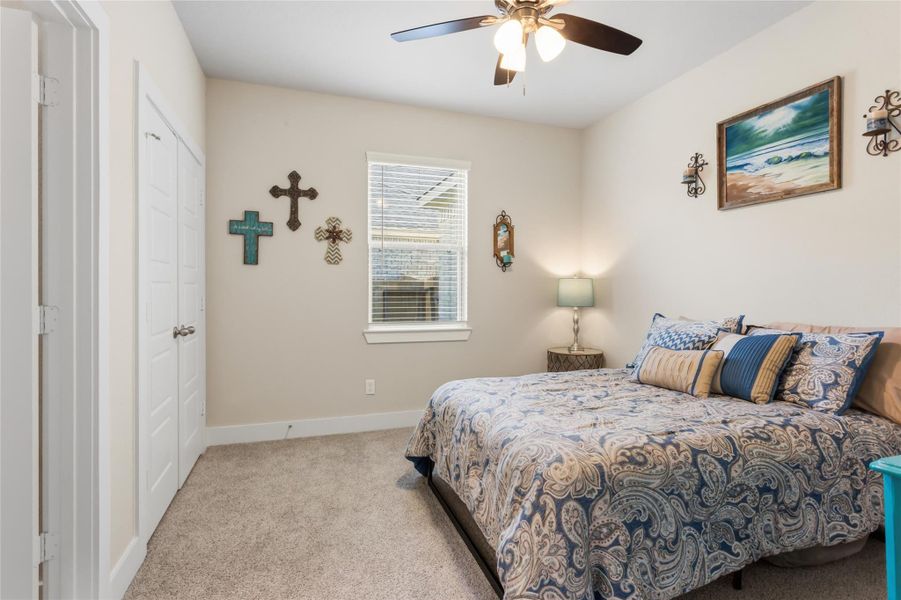 Cozy third bedroom with ample natural light. Cozy third bedroom with ample natural light.