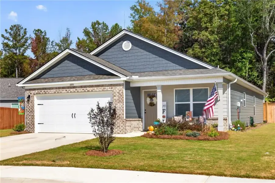 Front exterior of a new home in , Winder, GA, highlighting curb appeal (Image 21).