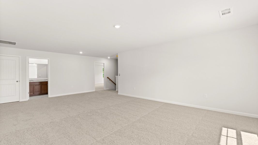 Representative unfurnished interior of a home built from the Mansfield by D.R. Horton in Falcon Landing, Gainesville (Image 22).