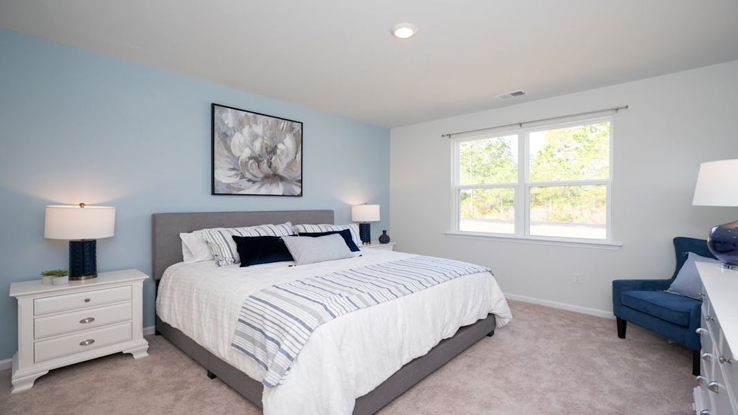 Representative furnished interior of a home built from the KERRY by D.R. Horton in Lochaven, Conway (Image 33).