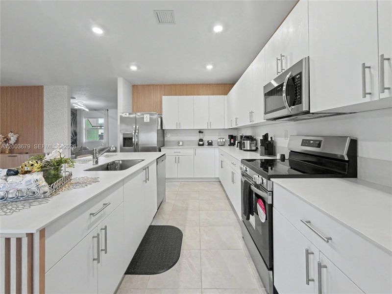 Furnished interior view inside a new home in , Miami (Image 10).