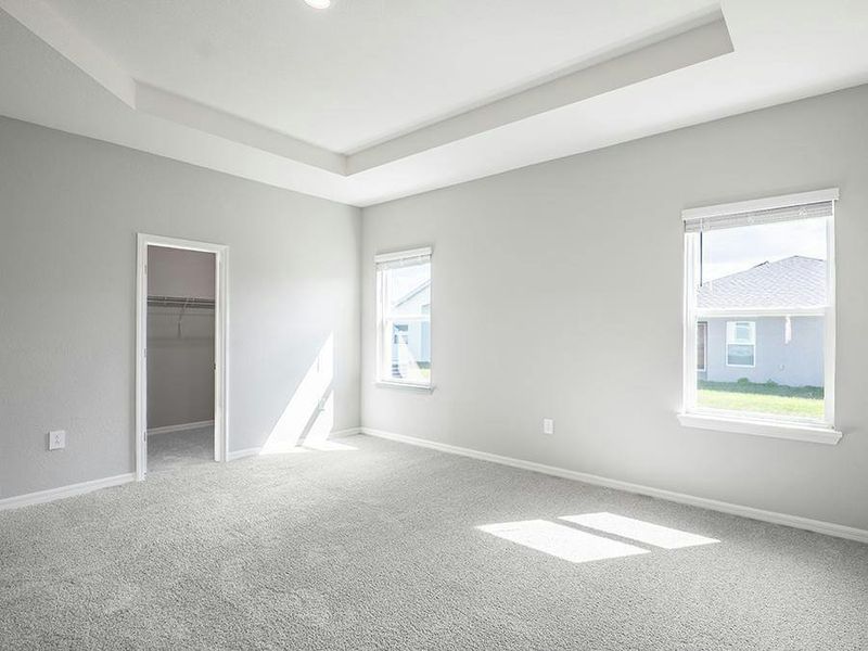 Your spacious owner`s suite awaits - Photos showcase a home with similar finishes, not the actual home for sale.