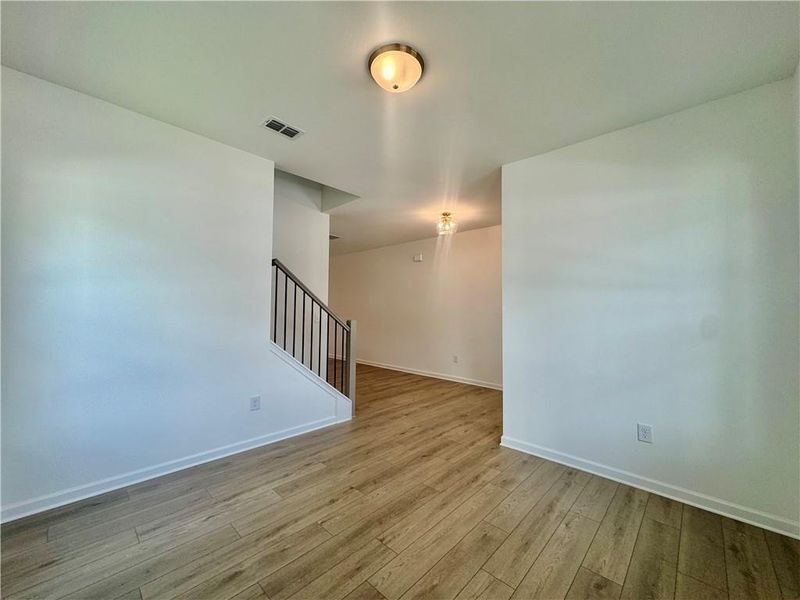Spacious, unfurnished interior of a new home in Eastlyn Crossing, Flowery Branch (Image 14).